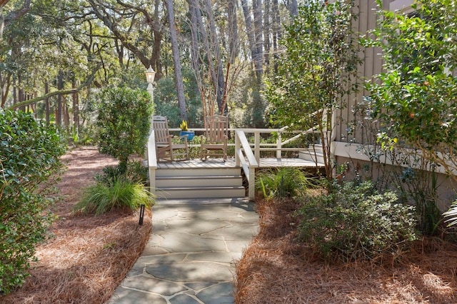 view of property's community with a wooden deck