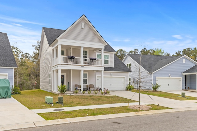 68 Red Bluff St, Summerville, SC 29483 - view of front facade with a balcony, driveway, a front yard, covered porch, and a shingled roof
