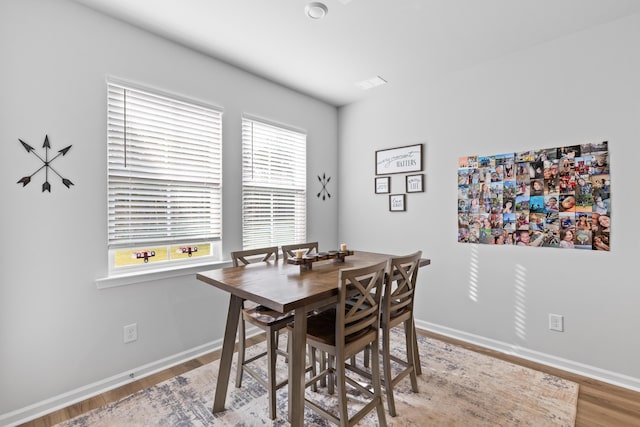 68 Red Bluff St, Summerville, SC 29483 - dining area featuring baseboards and wood finished floors