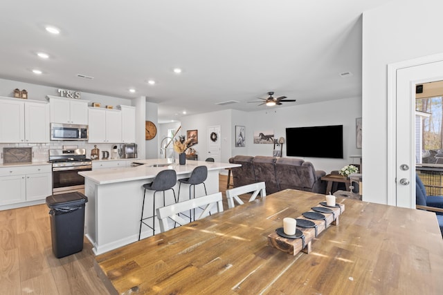 68 Red Bluff St, Summerville, SC 29483 - dining space featuring visible vents, ceiling fan, recessed lighting, and light wood-style floors