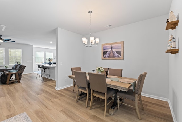 68 Red Bluff St, Summerville, SC 29483 - dining room featuring baseboards, visible vents, an inviting chandelier, and light wood finished floors