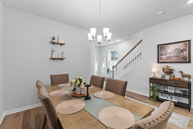 68 Red Bluff St, Summerville, SC 29483 - dining area featuring an inviting chandelier, baseboards, and wood finished floors