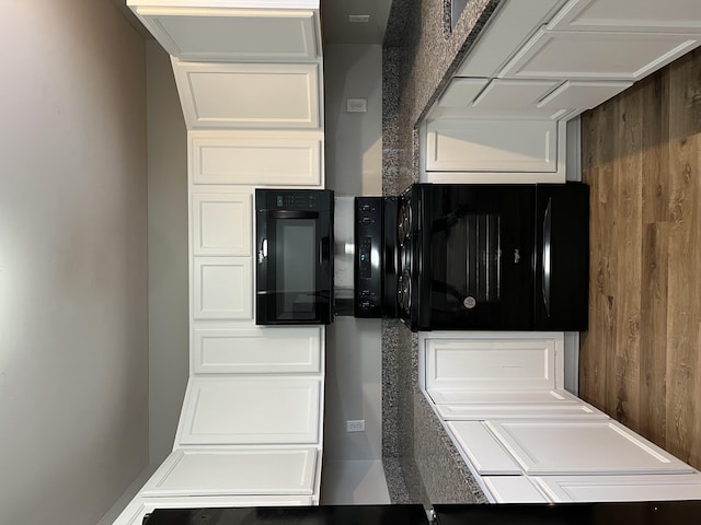 kitchen featuring white cabinetry