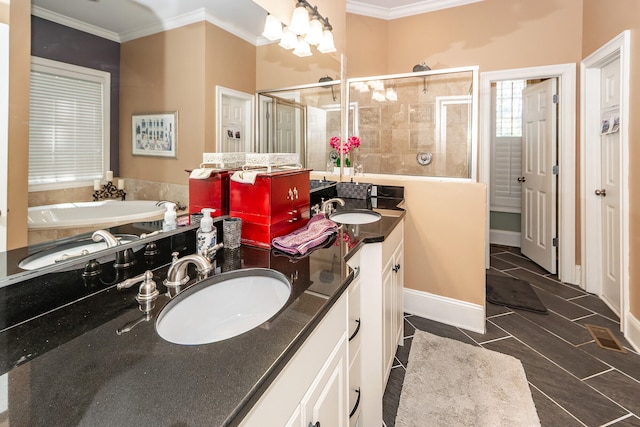 full bath featuring crown molding, a sink, double vanity, and a shower stall