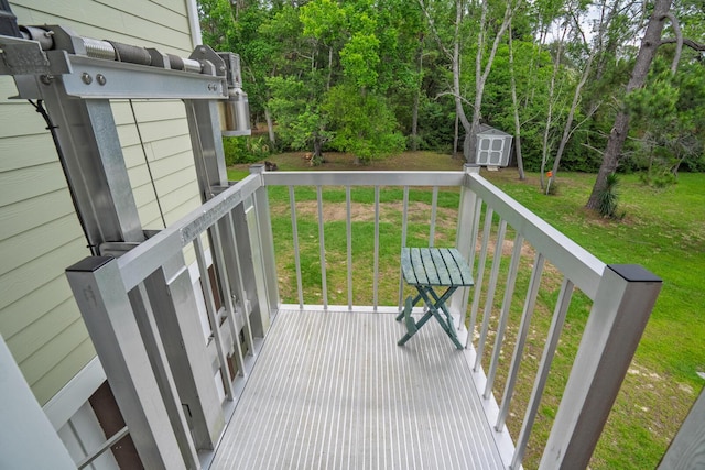 1064 Blackbear Dr, Edisto Island, SC 29438 - wooden deck featuring a storage shed and a yard