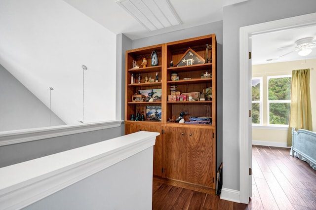 1064 Blackbear Dr, Edisto Island, SC 29438 - hall featuring dark wood-style flooring and baseboards