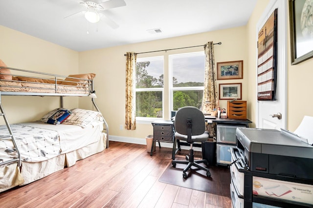 1064 Blackbear Dr, Edisto Island, SC 29438 - bedroom featuring wood finished floors and a desk