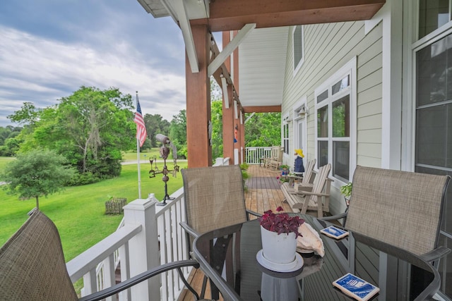 1064 Blackbear Dr, Edisto Island, SC 29438 - wooden porch with a lawn