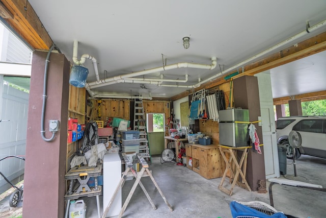 1064 Blackbear Dr, Edisto Island, SC 29438 - garage featuring freestanding refrigerator