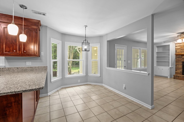 5488 Altamaha Dr, North Charleston, SC 29420 - unfurnished dining area featuring light tile patterned floors, plenty of natural light, and ceiling fan