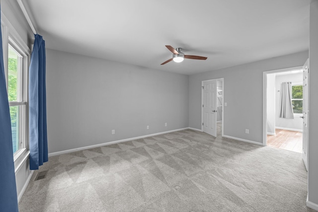 5488 Altamaha Dr, North Charleston, SC 29420 - empty room featuring carpet floors, a ceiling fan, and baseboards