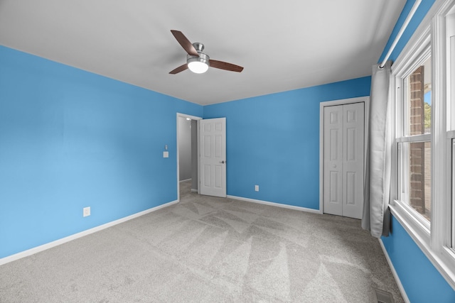 5488 Altamaha Dr, North Charleston, SC 29420 - unfurnished bedroom featuring carpet flooring, a closet, baseboards, and a ceiling fan