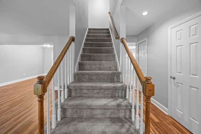 5488 Altamaha Dr, North Charleston, SC 29420 - staircase with wood finished floors, baseboards, and recessed lighting