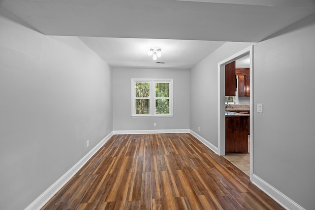 5488 Altamaha Dr, North Charleston, SC 29420 - unfurnished dining area with dark wood-type flooring and baseboards