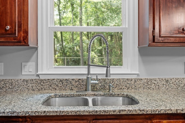 5488 Altamaha Dr, North Charleston, SC 29420 - kitchen featuring a sink and light stone counters