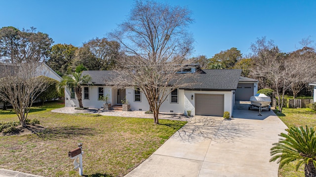 single story home with concrete driveway, an attached garage, a front lawn, and a shingled roof