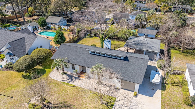 birds eye view of property with a residential view