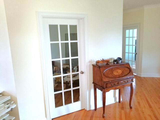 doorway to outside featuring wood-type flooring