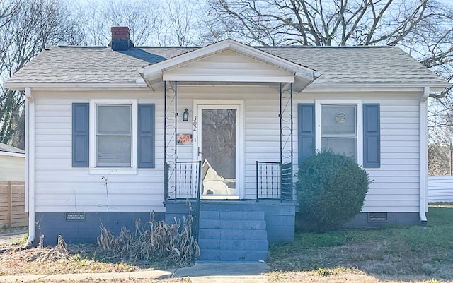 302 Morgan St, Greer, SC 29651 - bungalow with crawl space, a shingled roof, and a chimney
