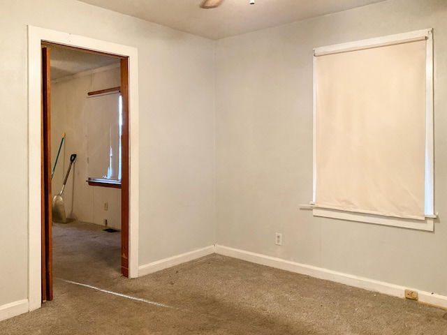 302 Morgan St, Greer, SC 29651 - carpeted empty room featuring baseboards and ceiling fan