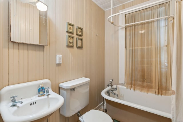 bathroom featuring sink and toilet