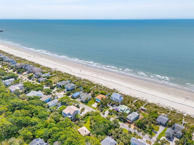 aerial view featuring a view of the beach and a water view