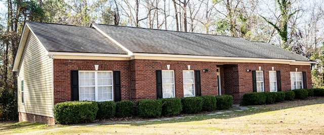 view of home's exterior featuring a yard