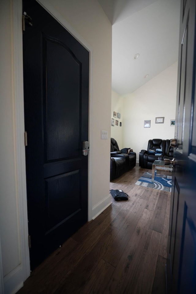 hallway featuring dark wood-type flooring