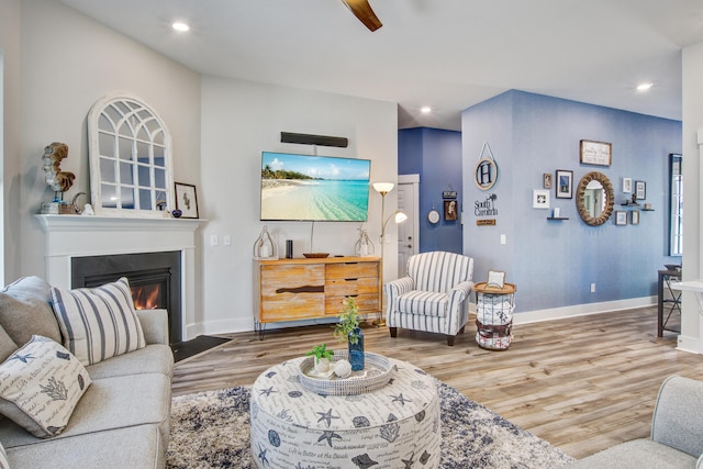1641 Adventure Xing, Mount Pleasant, SC 29466 - living room featuring wood finished floors, a fireplace with flush hearth, ceiling fan, and recessed lighting