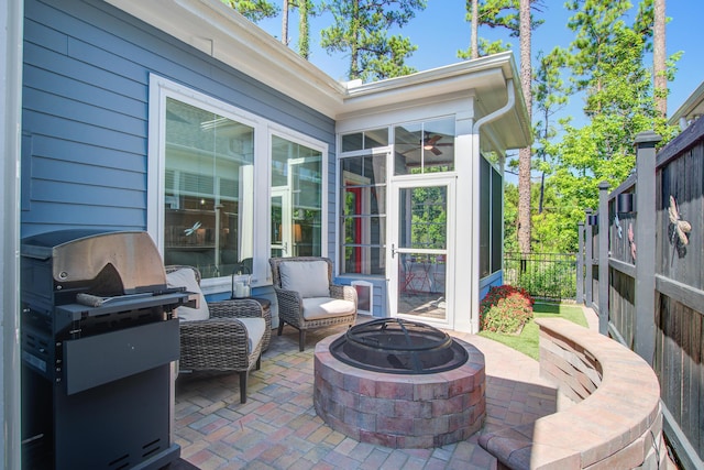 1641 Adventure Xing, Mount Pleasant, SC 29466 - view of patio / terrace featuring an outdoor fire pit, grilling area, and a sunroom