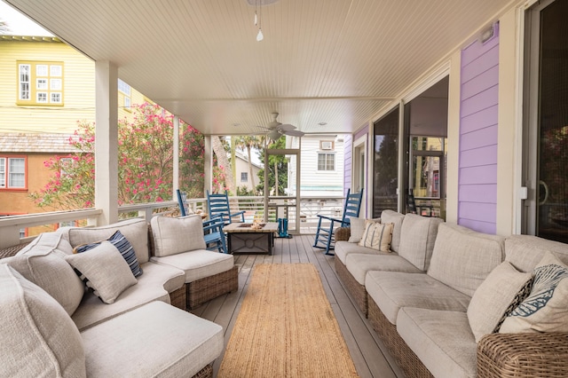 exterior space featuring ceiling fan and outdoor lounge area