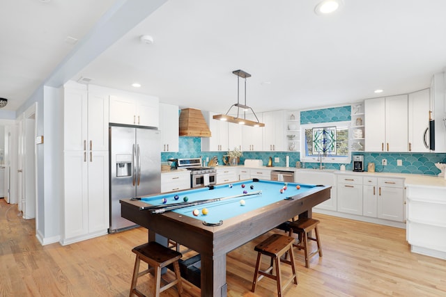 recreation room with recessed lighting, billiards, light wood finished floors, and a sink