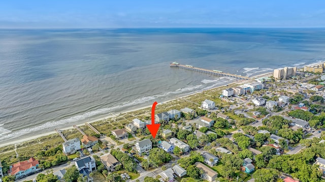 bird's eye view featuring a beach view and a water view