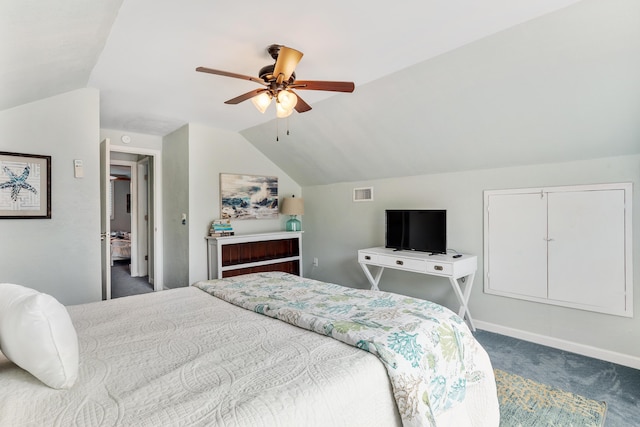 bedroom featuring ceiling fan, visible vents, vaulted ceiling, carpet floors, and baseboards