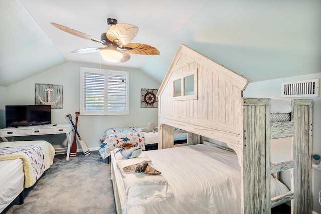 carpeted bedroom with baseboards, visible vents, ceiling fan, and vaulted ceiling