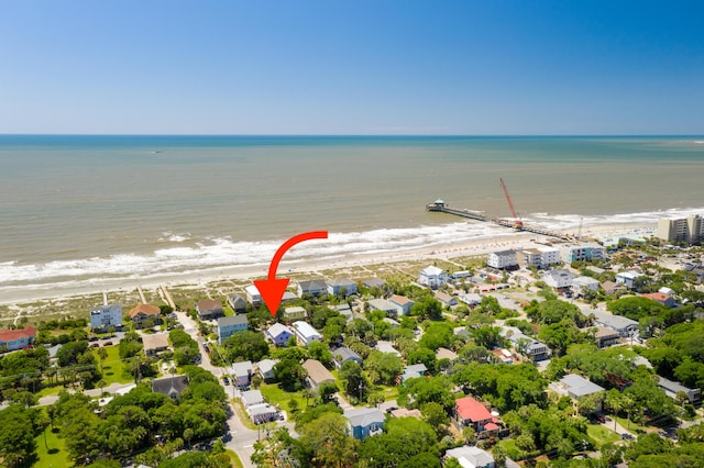 bird's eye view featuring a water view and a view of the beach