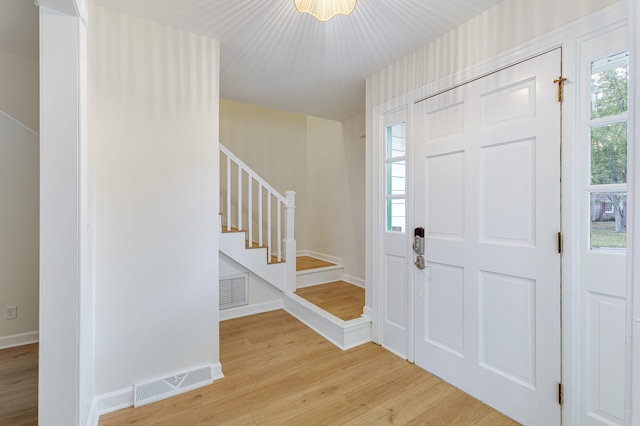 foyer entrance featuring light hardwood / wood-style floors