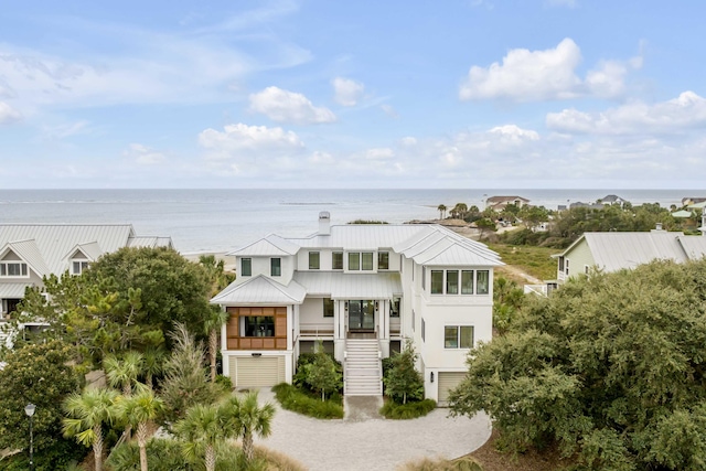 view of front facade with a water view