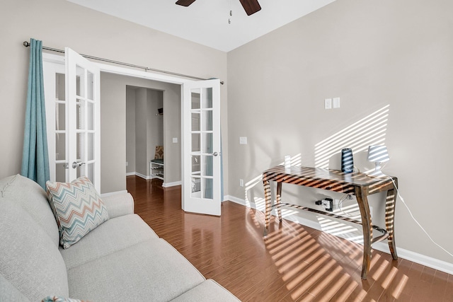 living room featuring french doors, dark hardwood / wood-style flooring, and ceiling fan