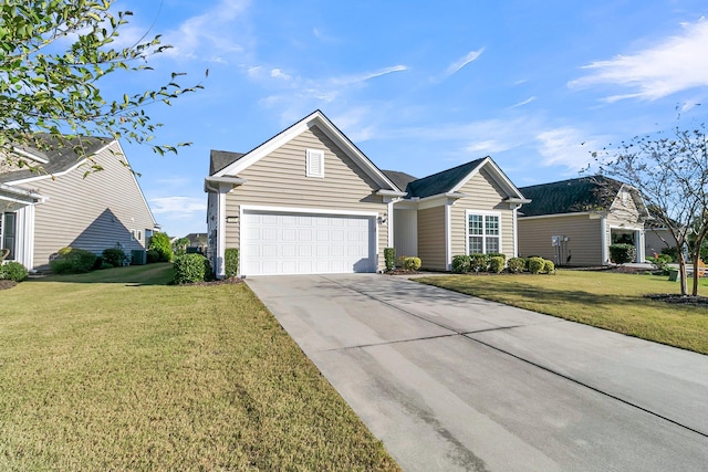 view of front of property featuring a garage and a front yard