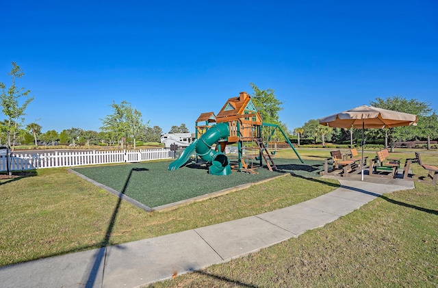 view of play area featuring a lawn