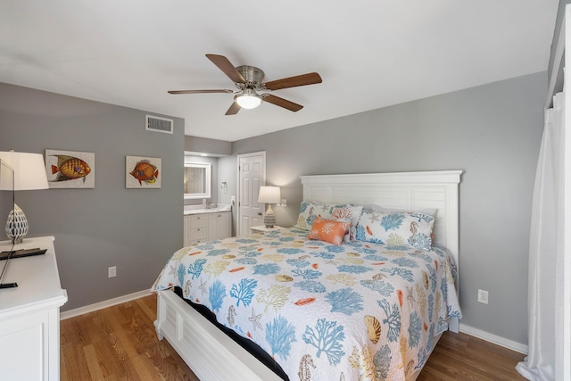 1605 Live Oak Park, Seabrook Island, SC 29455 - bedroom with wood finished floors, baseboards, a ceiling fan, and ensuite bathroom