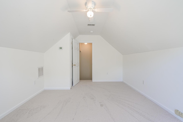 bonus room featuring visible vents, baseboards, ceiling fan, and vaulted ceiling