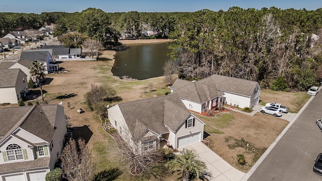 bird's eye view with a water view