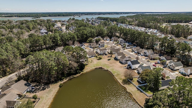 birds eye view of property featuring a residential view and a water view