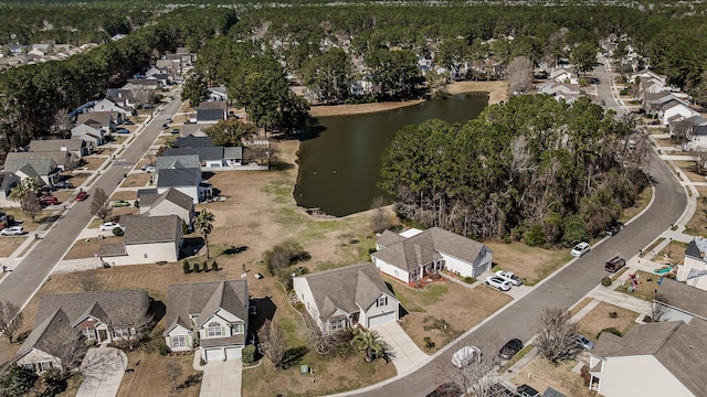 aerial view with a residential view and a water view