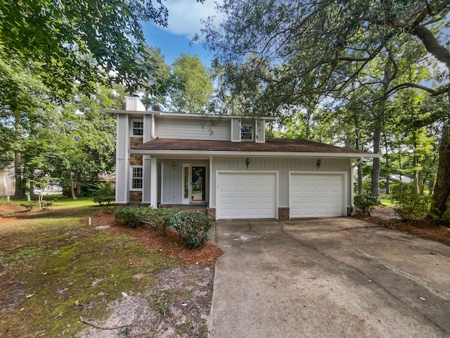 109 Evance Ct, Summerville, SC 29485 - view of front of home with a chimney, driveway, and board and batten siding