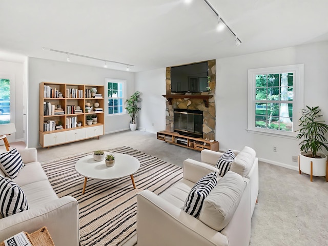 109 Evance Ct, Summerville, SC 29485 - living area featuring rail lighting, carpet flooring, and a fireplace