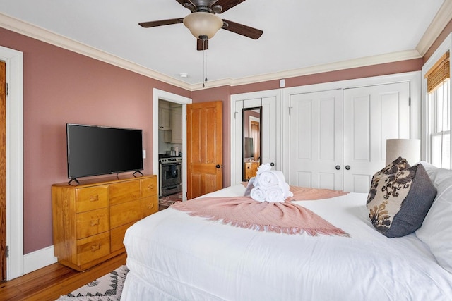 162 Spring St, Charleston, SC 29403 - bedroom with ornamental molding, wood finished floors, a ceiling fan, and baseboards