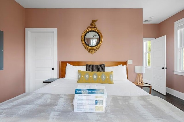 162 Spring St, Charleston, SC 29403 - bedroom with baseboards and wood finished floors